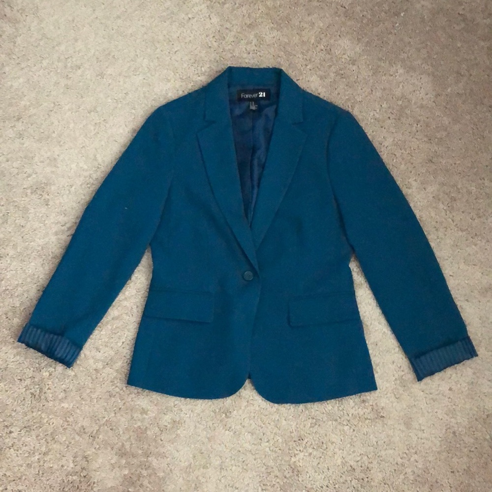 Teal women’s blazer.